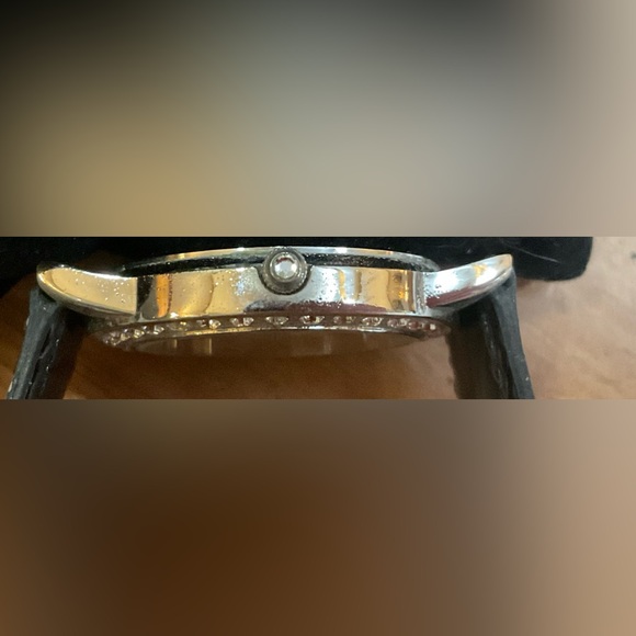 Disney:Pearlized back round with silver top of Mickey head on watch face w/ CZ. - Picture 3 of 8